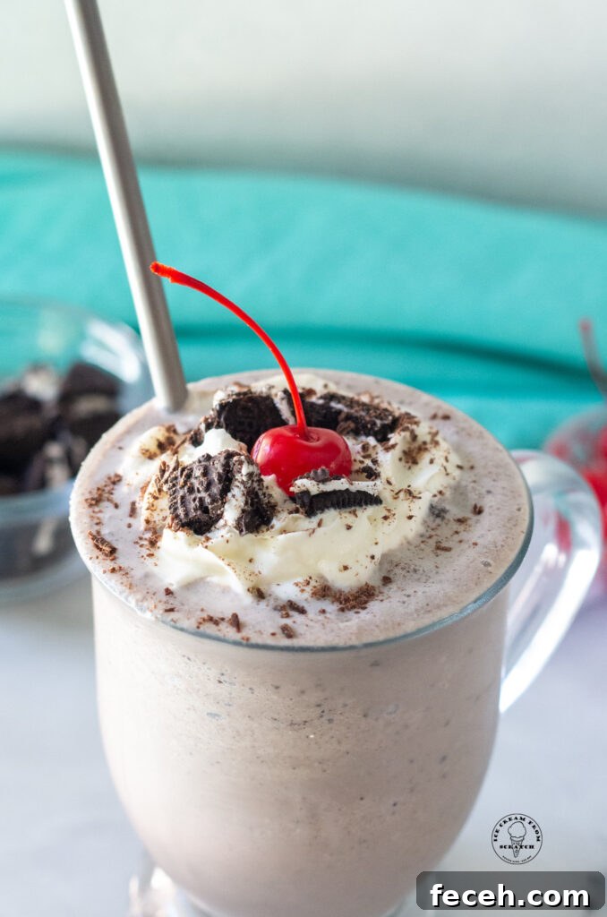 Cookies and Cream Milkshake Recipe — Creamy Oreo Shake Guide 4 close up of top of a cookies and cream milkshake