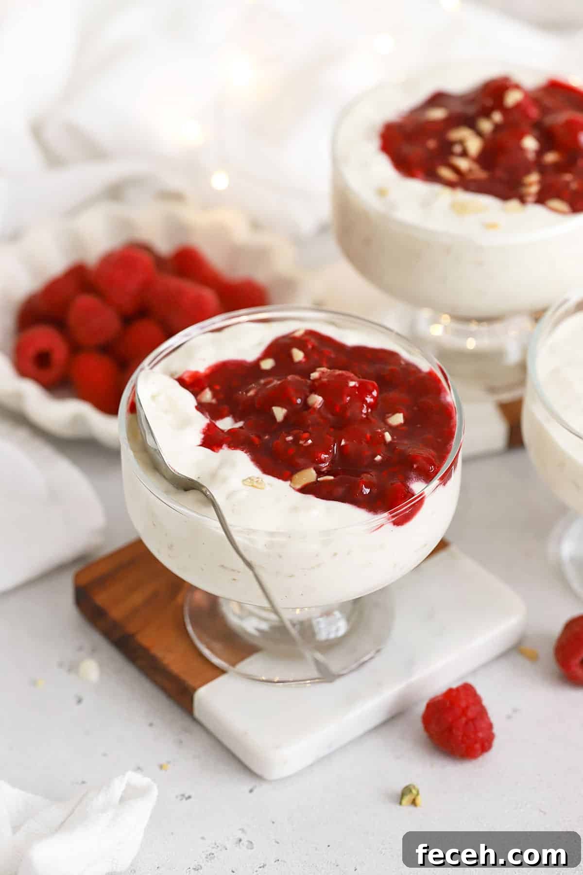 Risalamande with raspberry sauce in dessert bowls