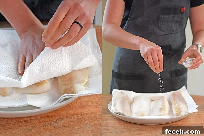 Patting dry cod filets with paper towels and sprinkling salt on the fish.