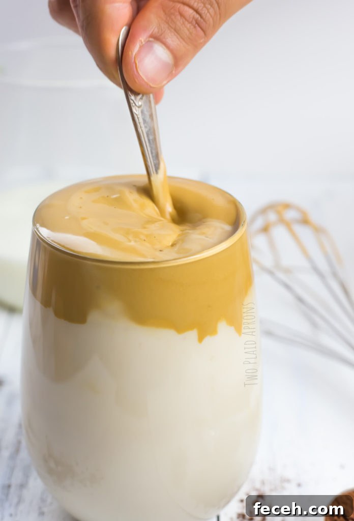 Stirring the coffee.