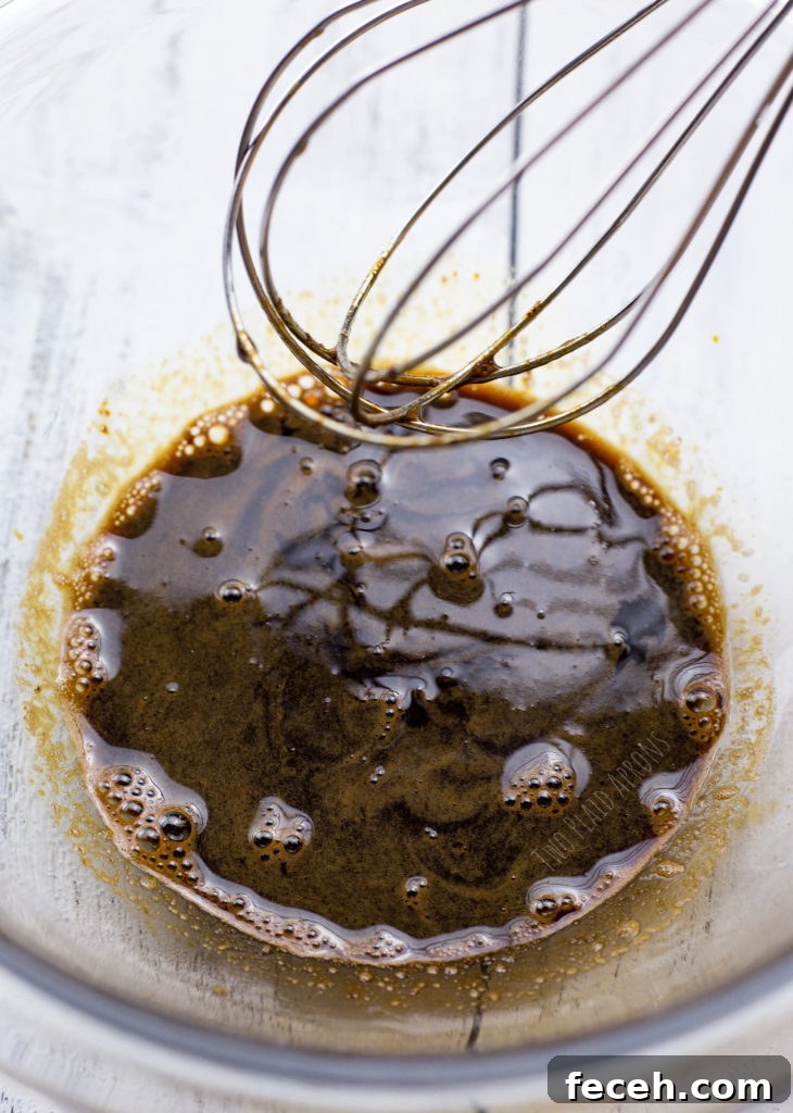Whisking the coffee mixture to dissolve.