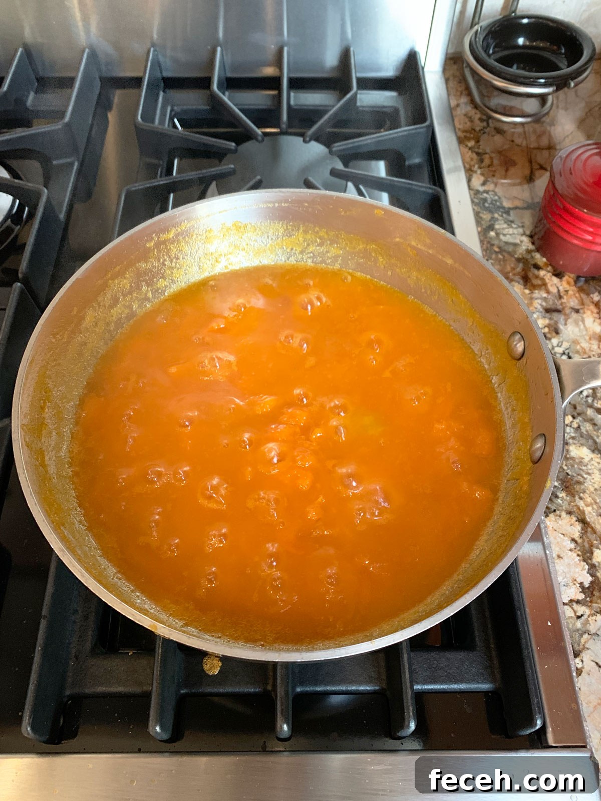 Apricot preserves in pot ready to be ladled into jars.