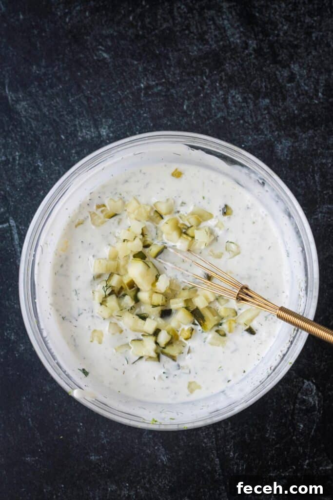 Chopped dill pickles added to a creamy tartar sauce.