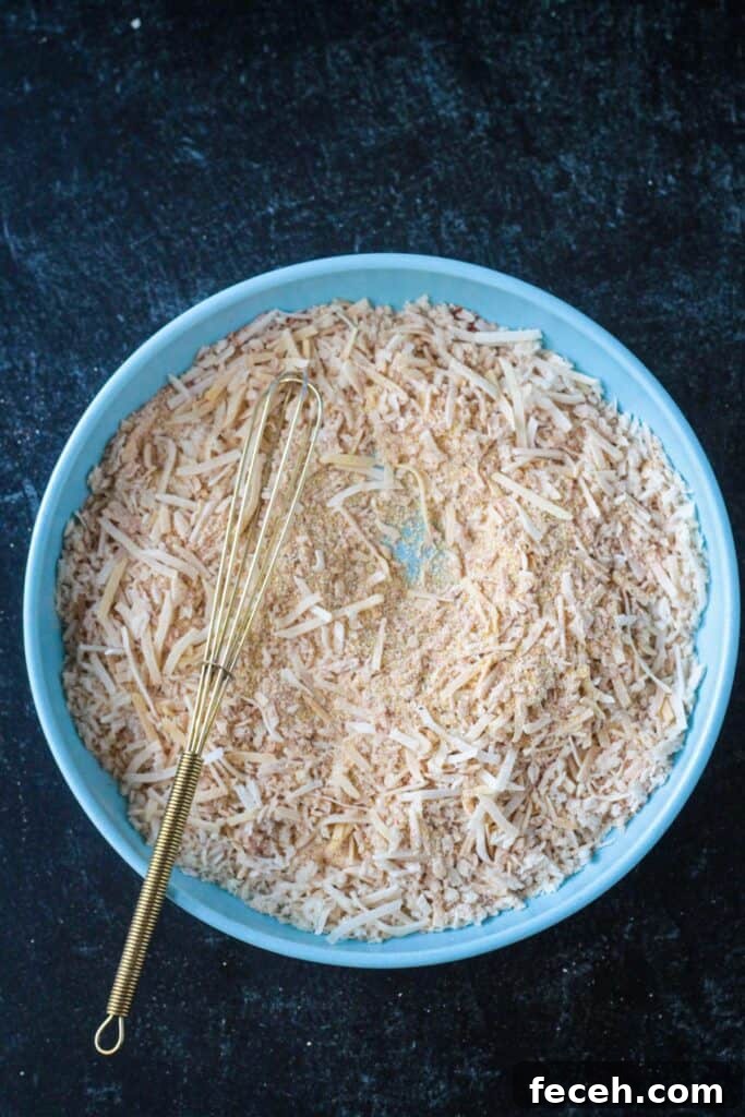 Dry breading ingredients whisked in a bowl.