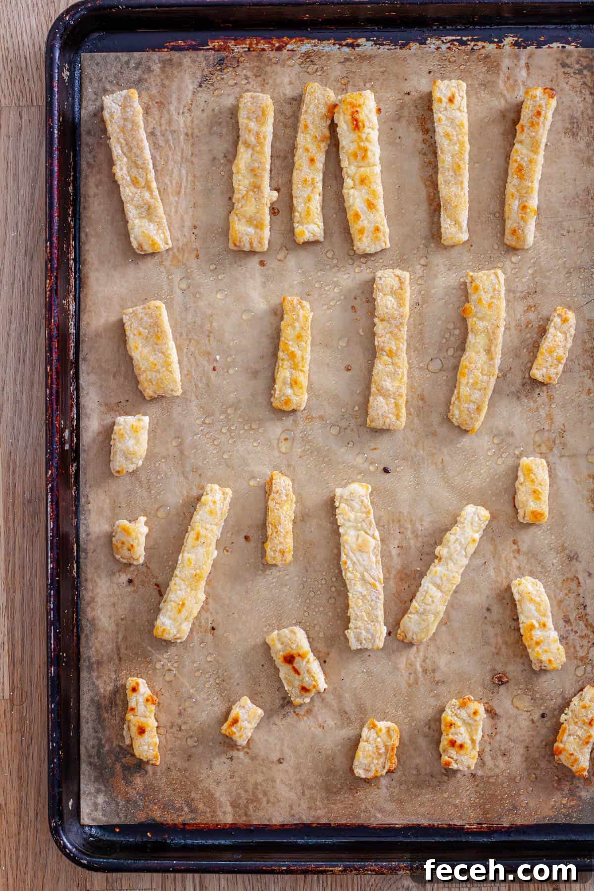 Crispy oven-roasted tofu strips ready for tofu wraps.